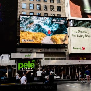 "Blissful Ignorance" on a video screen in Times Square, New York City.